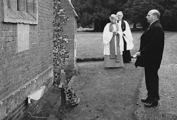 Remembrance Sunday 1999. Margaret Davey assited by Rev Anthony Fothergill and Harold Hunt