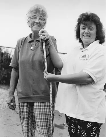 Phyllis Prior and Jane Macaulay. The Bell Inn's Longest Bean Competition