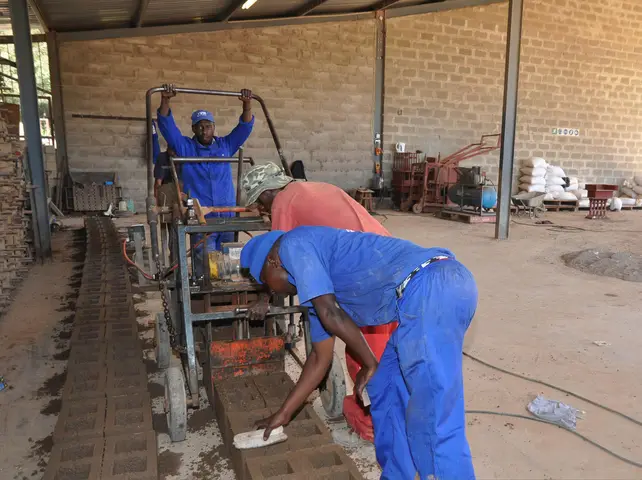 Fire Mfecane, block maker with Steve & Khanya. TVM Konstruksie. Swellendam 2019