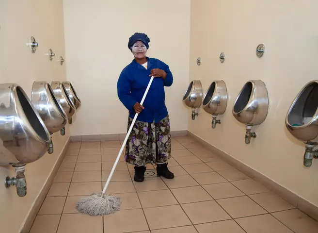 I met Koleka Orlucie and asked her if I could take her photograph. She readily agreed but insisted that it was to be at her place of work. The place was immaculate and it was a pleasure to meet someone who was so obviously proud of her work.